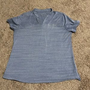 Women’s short sleeve Nike polo from the National PGA Tournament